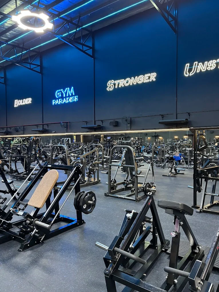 STRONGER · BOLDER · UNSTOPPABLE neon signs